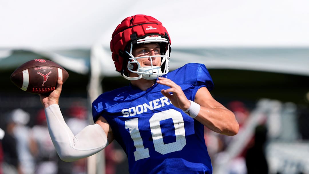 Oklahoma's John Mateer throws a pass during football practice for the University of Oklahoma Sooners in Norman, Okla., Wednesday, Aug., 6, 2025.