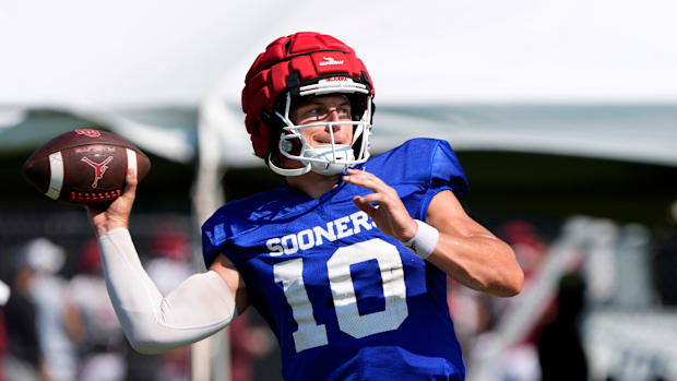 John Mateer throws a pass during Oklahoma football practice.