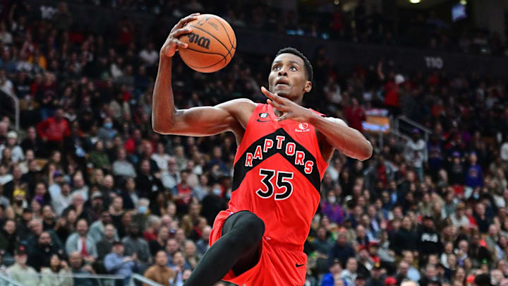 Oct 26, 2022; Toronto, Ontario, CAN; Toronto Raptors center Christian Koloko (35) goes to the basket against the Philadelphia 76ers in the second half at Scotiabank Arena. Mandatory Credit: Dan Hamilton-Imagn Images