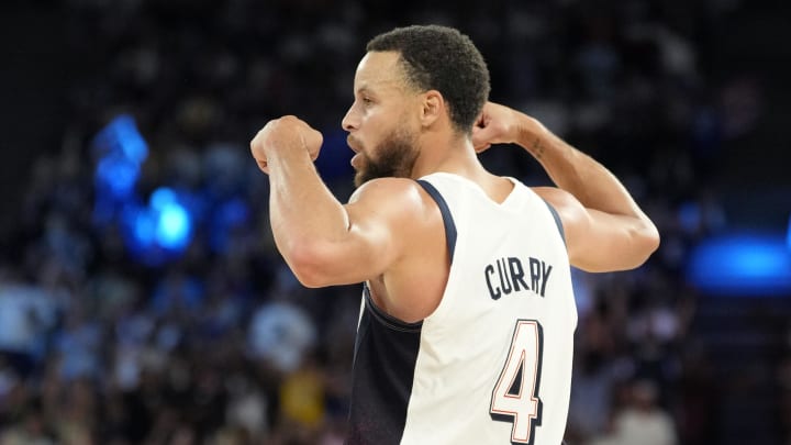 Aug 8, 2024; Paris, France; United States shooting guard Stephen Curry (4) celebrates during the second half against Serbia in a men's basketball semifinal game during the Paris 2024 Olympic Summer Games at Accor Arena. Mandatory Credit: Kyle Terada-USA TODAY Sports