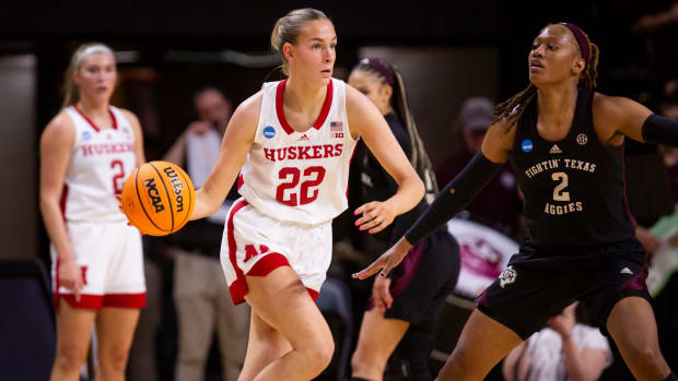 Nebraska forward Natalie Potts moves the ball up the court as Texas A&M takes on Nebraska in the first round of March Madness