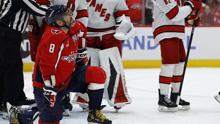May 15, 2025; Washington, District of Columbia, USA; Washington Capitals left wing Alex Ovechkin (8) looks up at the scoreboard while on a knee after a stoppage in play against the Carolina Hurricanes in the third period in game five of the second round of the 2025 Stanley Cup Playoffs at Capital One Arena. Mandatory Credit: Geoff Burke-Imagn Images May 15, 2025; Washington, District of Columbia, USA; Washington Capitals left wing Alex Ovechkin (8) looks up at the scoreboard while on a knee after a stoppage in play against the Carolina Hurricanes in the third period in game five of the second round of the 2025 Stanley Cup Playoffs at Capital One Arena. Mandatory Credit: Geoff Burke-Imagn Images