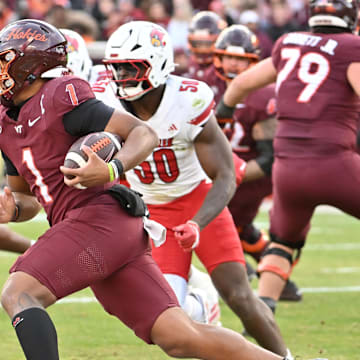Nov 1, 2025; Blacksburg, Va.; Virginia Tech quarterback Kyron Drones (1) runs the ball.