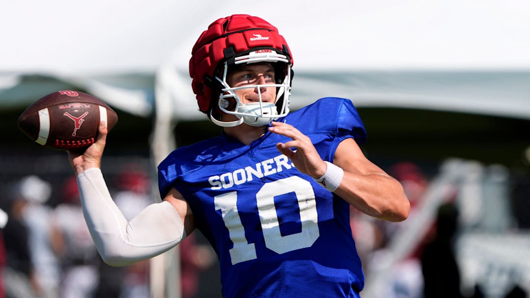 Oklahoma's John Mateer throws a pass during football practice for the University of Oklahoma Sooners in Norman, Okla., Wednesday, Aug., 6, 2025.