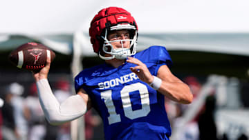 Oklahoma's John Mateer throws a pass during football practice for the University of Oklahoma Sooners in Norman, Okla., Wednesday, Aug., 6, 2025.