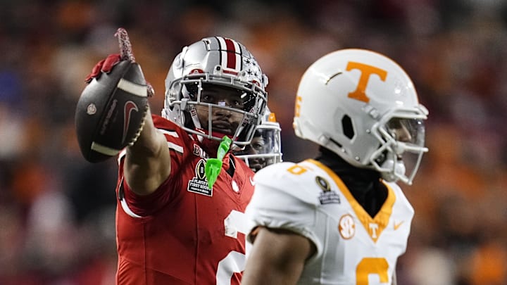 Emeka Egbuka celebrates a first down catch behind Tennessee Volunteers defensive back Jalen McMurray. Emeka Egbuka celebrates a first down catch behind Tennessee Volunteers defensive back Jalen McMurray.