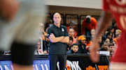 Nov 22, 2025; Stillwater, Oklahoma, USA; Oklahoma State Cowboys coach Steve Lutz watches game play during the first half against the Nicholls Colonels at Gallagher-Iba Arena. Mandatory Credit: William Purnell-Imagn Images