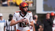 Oct 26, 2024; Berkeley, California, USA; Oregon State Beavers quarterback Ben Gulbranson (17) drops back to pass against the Oregon State Beavers during the second quarter at California Memorial Stadium. Mandatory Credit: Darren Yamashita-Imagn Images