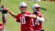 Jun 12, 2024; Foxborough, MA, USA;  New England Patriots quarterback Drake Maye (10) and quarterback Jacob y Brissett (14)  throw passes at minicamp at Gillette Stadium.  Mandatory Credit: Eric Canha-USA TODAY Sports