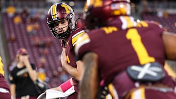 Oct 17, 2025; Minneapolis, Minnesota, USA; Minnesota Golden Gophers quarterback Drake Lindsey (5) warms up before the game against the Nebraska Cornhuskers at Huntington Bank Stadium. Mandatory Credit: Matt Krohn-Imagn Images