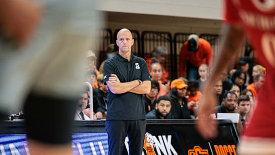 Nov 22, 2025; Stillwater, Oklahoma, USA; Oklahoma State Cowboys coach Steve Lutz watches game play during the first half against the Nicholls Colonels at Gallagher-Iba Arena. Mandatory Credit: William Purnell-Imagn Images