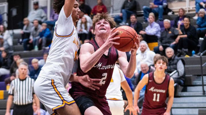 Dowling's Nathan Jenkins (2) looks to the basket on Dec. 16, 2025, at Johnston High School.