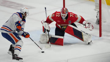 Florida Panthers goaltender Sergei Bobrovsky (72) defends against Edmonton Oilers forward Connor McDavid (97)