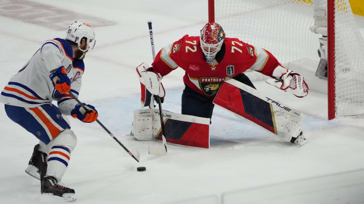 Jun 24, 2024; Sunrise, Florida, USA; Florida Panthers goaltender Sergei Bobrovsky (72) defends against Edmonton Oilers forward Connor McDavid (97) during the third period in game seven of the 2024 Stanley Cup Final at Amerant Bank Arena. Mandatory Credit: Jim Rassol-USA TODAY Sports