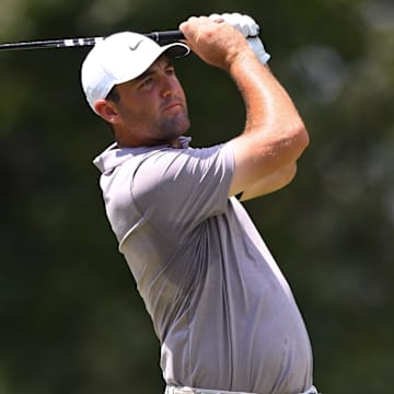 Scottie Scheffler will have fellow Tour pro Chris Kirk's caddie on his bag for the BMW Championship.  