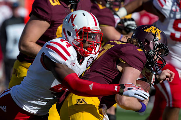 Nebraska Cornhuskers defensive end Randy Gregory sacks Minnesota Golden Gophers quarterback Mitch Leidner.