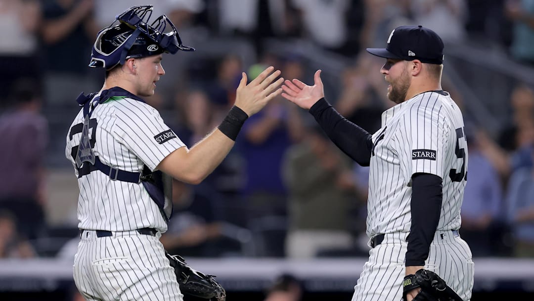 Aug 11, 2025; Bronx, New York, USA; New York Yankees catcher Ben Rice (22) and relief pitcher David Bednar (53) celebrate after defeating the Minnesota Twins during the ninth inning at Yankee Stadium. Mandatory Credit: Brad Penner-Imagn Images