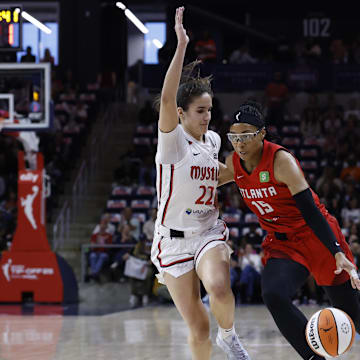 May 16, 2025; Washington, District of Columbia, USA; Atlanta Dream guard Allisha Gray (15) drives to the basket as Washington Mystics guard Sonia Citron (22) defends in the first half at CareFirst Arena. Mandatory Credit: Geoff Burke-Imagn Images