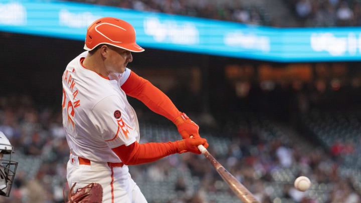 Aug 20, 2024; San Francisco, California, USA;  San Francisco Giants third base Matt Chapman (26) hits a single during the second inning against the Chicago White Sox at Oracle Park. 