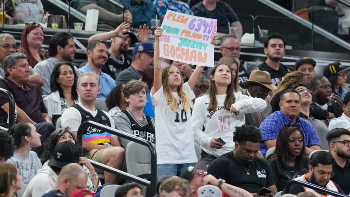 Mar 25, 2024; San Antonio, Texas, USA; A San Antonio Spurs fan holds up a sign for Spurs forward Jeremy Sochan (10) in the first half against the Phoenix Suns at Frost Bank Center.