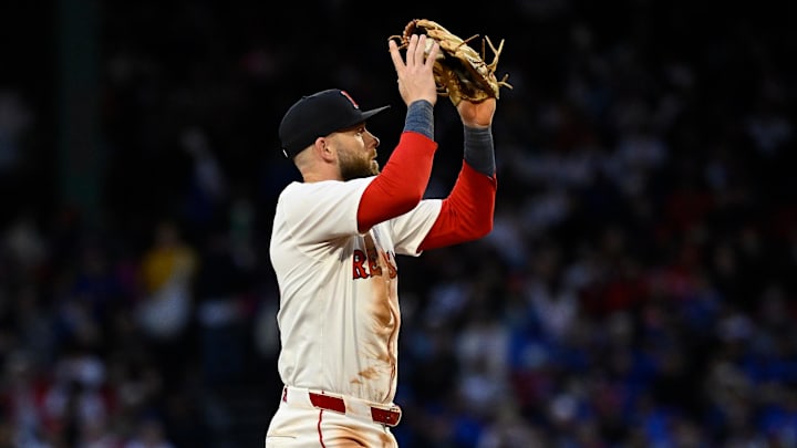 May 19, 2025; Boston, Massachusetts, USA; Boston Red Sox shortstop Trevor Story (10) makes a catch for an out against the New York Mets during the fourth inning at Fenway Park. Mandatory Credit: Eric Canha-Imagn Images