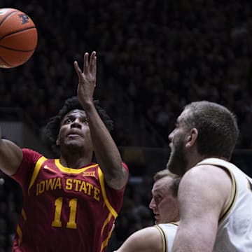 Iowa State is favored against Iowa in college basketball action on Thursday.