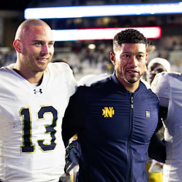 Nov 1, 2025; Chestnut Hill, Massachusetts, USA; Notre Dame Fighting Irish head coach Marcus Freeman, Notre Dame Fighting Irish quarterback CJ Carr (13) and Notre Dame Fighting Irish defensive lineman Donovan Hinish (41) after the game against the Boston College Eagles at Alumni Stadium. 