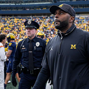 Sherrone Moore will miss two games in the upcoming season after Michigan self-imposed the suspension.