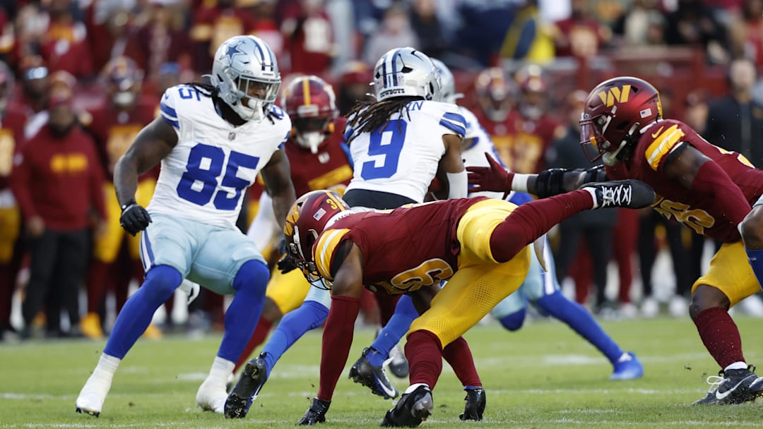 Nov 24, 2024; Landover, Maryland, USA; Dallas Cowboys wide receiver KaVontae Turpin (9) returns a kickoff for a touchdown against the Washington Commanders during the fourth quarter at Northwest Stadium. Mandatory Credit: Geoff Burke-Imagn Images