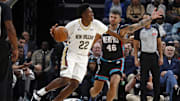 Oct 22, 2025; Memphis, Tennessee, USA; New Orleans Pelicans center Derik Queen (22) dribbles as Memphis Grizzlies John Konchar (46) defends during the second quarter at FedExForum. Mandatory Credit: Petre Thomas-Imagn Images