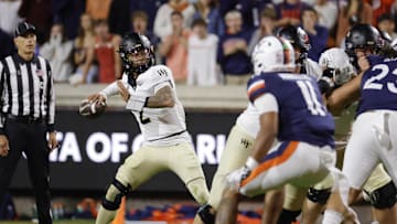 Nov 8, 2025; Charlottesville, Virginia, USA; Wake Forest Demon Deacons quarterback Robby Ashford (2) throws the ball against the Virginia Cavaliers during the first half at Scott Stadium. Mandatory Credit: Amber Searls-Imagn Images