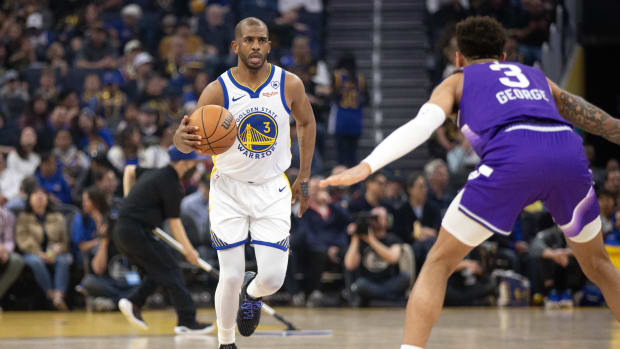 Apr 14, 2024; San Francisco, California, USA; Golden State Warriors guard Chris Paul (3) brings the ball up court against the Utah Jazz during the first quarter at Chase Center. Mandatory Credit: D. Ross Cameron-USA TODAY Sports