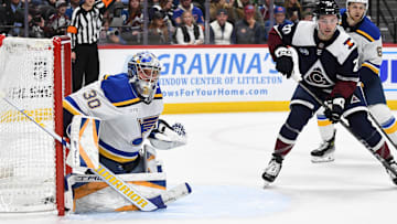 Jan 31, 2025; Denver, Colorado, USA; St. Louis Blues goaltender Joel Hofer (30) watches the puck during the second period against the Colorado Avalanche at Ball Arena. Mandatory Credit: Christopher Hanewinckel-Imagn Images