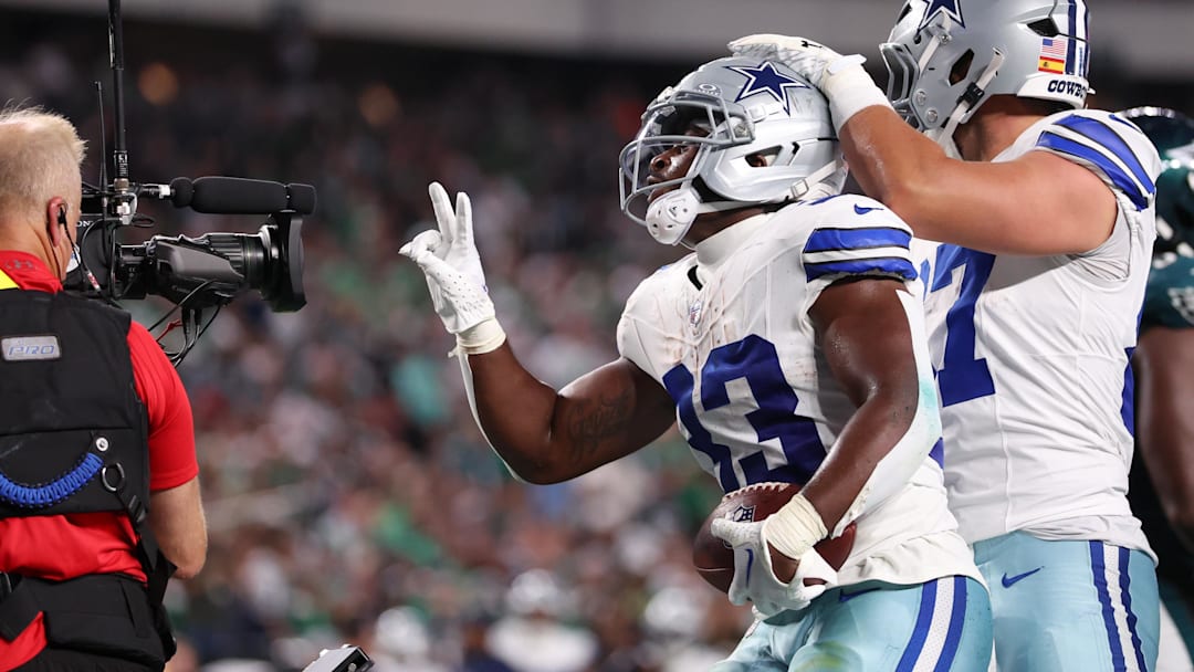 Sep 4, 2025; Philadelphia, Pennsylvania, USA; Dallas Cowboys running back Javonte Williams (33) celebrates with his teammates after scoring a touchdown against the Philadelphia Eagles during the first quarter of the game at Lincoln Financial Field. Mandatory Credit: Bill Streicher-Imagn Images