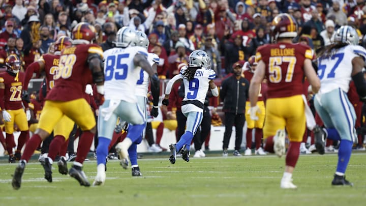 Dallas Cowboys wide receiver KaVontae Turpin returns a kickoff for a touchdown against the Washington Commanders during the fourth quarter at Northwest Stadium. 