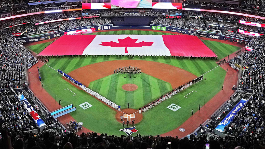 Mar 27, 2025; Toronto, Ontario, CAN; A general view of the Rogers Centre during the national anthem before the start of the opening day game between the Toronto Blue Jays and the Baltimore Orioles. Mandatory Credit: Nick Turchiaro-Imagn Images Mar 27, 2025; Toronto, Ontario, CAN; A general view of the Rogers Centre during the national anthem before the start of the opening day game between the Toronto Blue Jays and the Baltimore Orioles. Mandatory Credit: Nick Turchiaro-Imagn Images