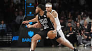 Oct 29, 2024; Brooklyn, New York, USA; Brooklyn Nets small guard Cam Thomas (24) dribbles the ball against Denver Nuggets small forward Michael Porter Jr. (1) during the first half at Barclays Center. Mandatory Credit: Gregory Fisher-Imagn Images
