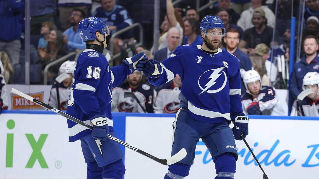 Mar 10, 2026; Tampa, Florida, USA; Tampa Bay Lightning defenseman Victor Hedman (77) and defenseman Steve Santini (16) react to an assist on a goal against the Columbus Blue Jackets in the first period at Benchmark International Arena. Mandatory Credit: Nathan Ray Seebeck-Imagn Images