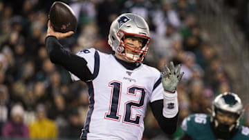 New England's Tom Brady (12) throws downfield against the Eagles on Nov. 17, 2019.