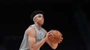 Mar 8, 2025; Atlanta, Georgia, USA; Indiana Pacers forward Enrique Freeman (8) warms up on the court before the game against the Atlanta Hawks at State Farm Arena. Mandatory Credit: Mady Mertens-Imagn Images