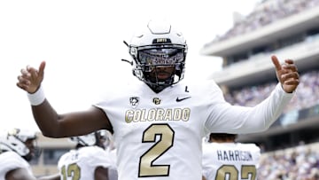 Sep 2, 2023; Fort Worth, Texas, USA; Colorado Buffaloes quarterback Shedeur Sanders (2) celebrates a touchdown in the first quarter against the TCU Horned Frogs at Amon G. Carter Stadium. Mandatory Credit: Tim Heitman-Imagn Images