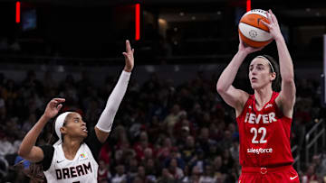 Clark shoots a three-pointer during a game between the Indiana Fever and the Atlanta Dream at Gainbridge Fieldhouse.