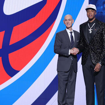 Jun 25, 2025; Brooklyn, NY, USA;  Thomas Sorber stands with NBA commissioner Adam Silver after being selected as the 15th pick by the Oklahoma City Thunder in the first round of the 2025 NBA Draft at Barclays Center. Mandatory Credit: Brad Penner-Imagn Images