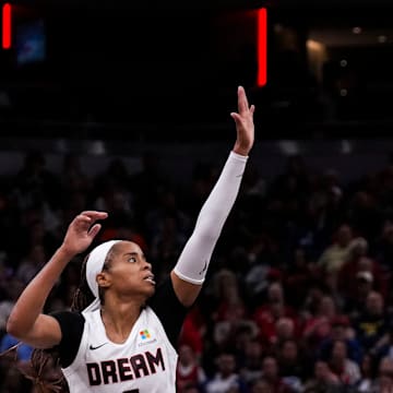 Indiana Fever guard Caitlin Clark (22) shoots a 3-pointer Sunday, Sept. 8, 2024, during a game between the Indiana Fever and the Atlanta Dream at Gainbridge Fieldhouse in Indianapolis. The Fever defeated the Dream in overtime, 104-100.