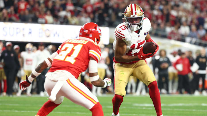 Feb 11, 2024; Paradise, Nevada, USA; San Francisco 49ers wide receiver Jauan Jennings (15) scores a touchdown against Kansas City Chiefs safety Mike Edwards (21) in the second half in Super Bowl LVIII at Allegiant Stadium. Mandatory Credit: Mark J. Rebilas-Imagn Images