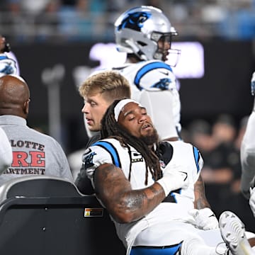 Then Carolina Panthers linebacker Shaq Thompson (7) is shown after breaking his fibula in 2023.