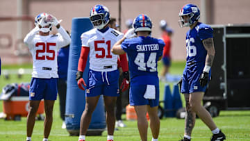 May 10, 2025; East Rutherford, NJ, USA; New York Giants cornerback Korie Black (25), linebacker Abdul Carter (51), running back Cam Skattebo (44) and tight end Thomas Fidone II (86) chat during rookie minicamp at Quest Diagnostics Training Center. Mandatory Credit: John Jones-Imagn Images