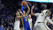 Feb 1, 2025; Winston-Salem, North Carolina, USA; Pittsburgh Panthers guard Jaland Lowe (15) shoots under pressure from Wake Forest Demon Deacons guard Hunter Sallis (23) during the second half at Lawrence Joel Veterans Memorial Coliseum. Mandatory Credit: Jim Dedmon-Imagn Images