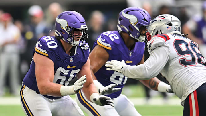 Aug 16, 2025; Minneapolis, Minnesota, USA; Minnesota Vikings guard Joe Huber (60) goes to block New England Patriots defensive tackle Jeremiah Pharms Jr. (98) during the fourth quarter at U.S. Bank Stadium. Mandatory Credit: Jeffrey Becker-Imagn Images