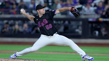 Sep 12, 2025; New York City, New York, USA; New York Mets relief pitcher Ryan Helsley (56) pitches against the Texas Rangers during the ninth inning at Citi Field. Mandatory Credit: Brad Penner-Imagn Images